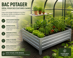 Bac potager en acier galvanisé installé dans une serre de jardin avec légumes et herbes aromatiques